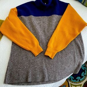 FREE PEOPLE  color block sweater small but generous fit